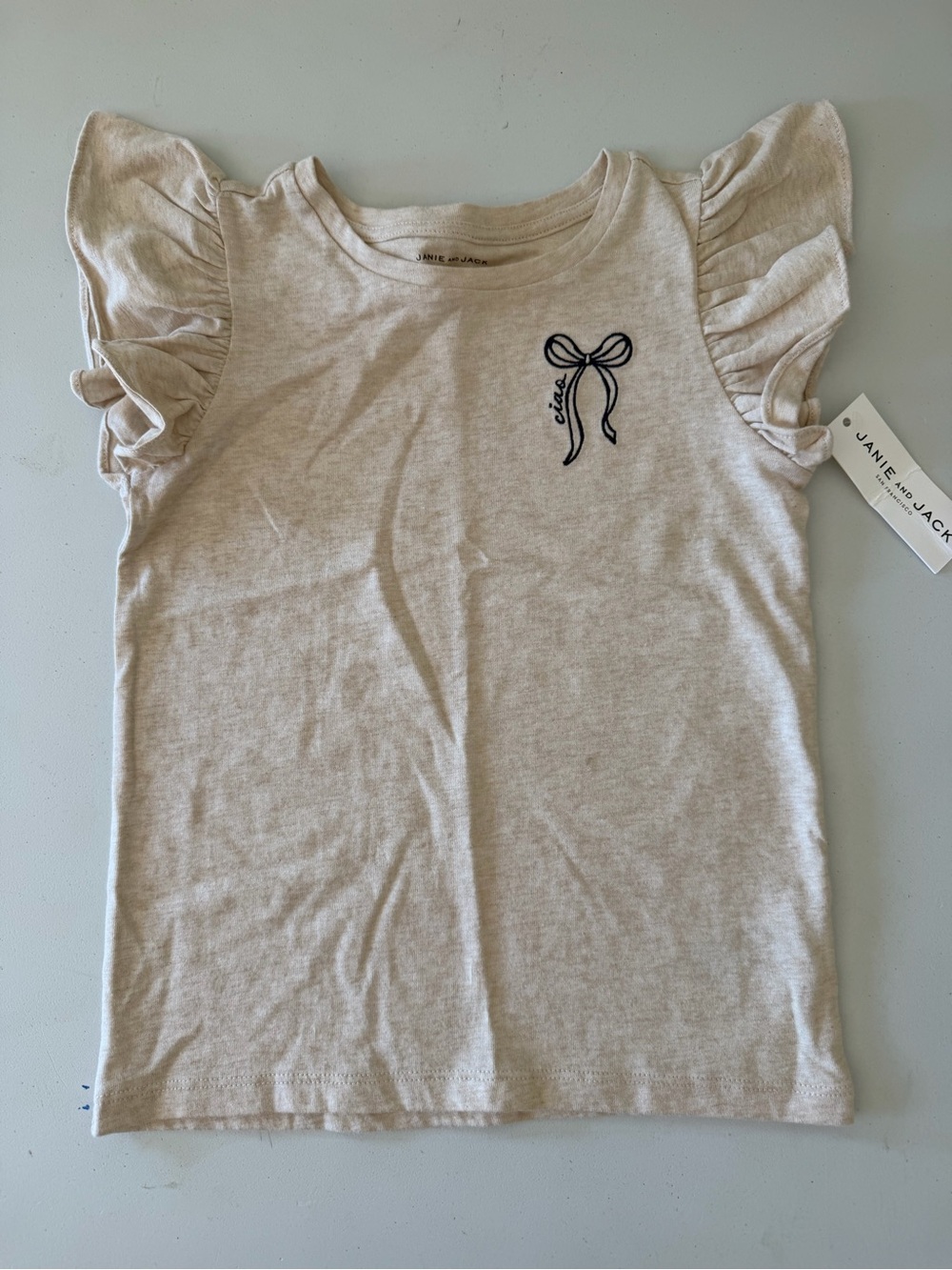 Janie and Jack Cream Ruffle Sleeve Tee with Navy Bow